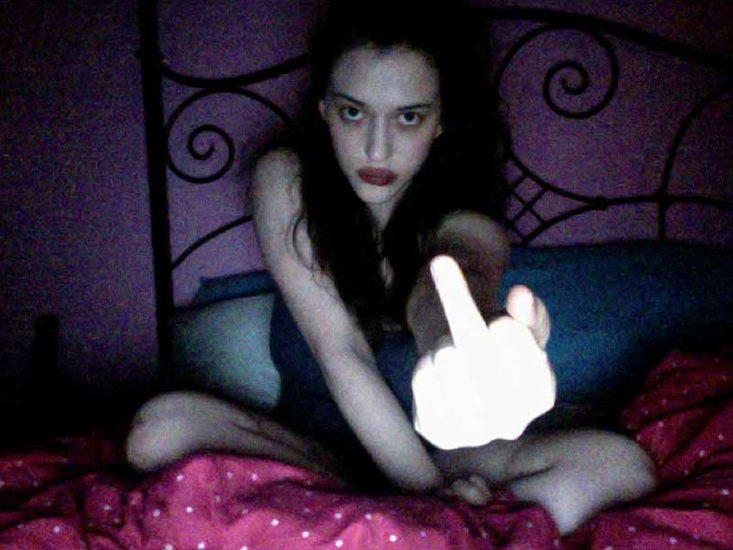 Kat Dennings flipping a bird