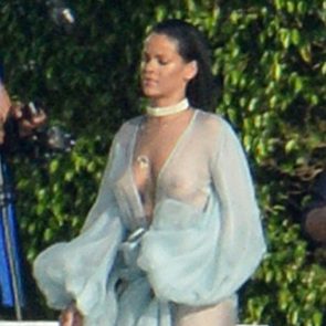 rihanna naked boobs in yard showing tits