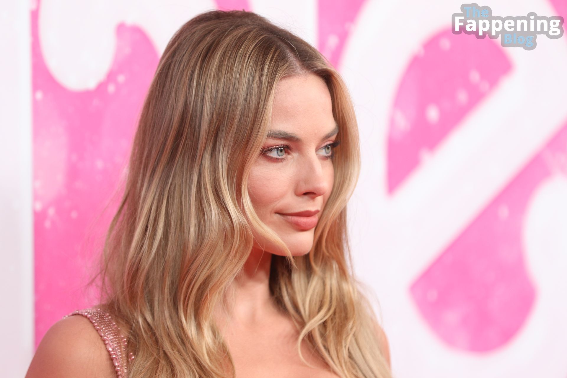 Margot Robbie Looks Sexy in a Vintage Dress at the ‘Barbie’ Party in Sydney (Photos)